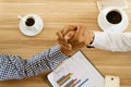 Two hand businessman partner or business rivals clash arm wrestle on table in cafÃÂ©.Concept business competition Royalty Free Stock Photo