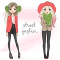 Two hand drawn beautiful cute autumn fashion girls.