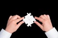 Two hand holding connecting piece jigsaw puzzle, Business connection, success and strategy concept. Royalty Free Stock Photo
