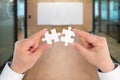 Two hand holding connecting piece jigsaw puzzle, Business connection, success and strategy concept. Royalty Free Stock Photo