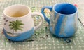 Two hand-painted ceramic mugs Royalty Free Stock Photo