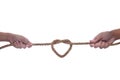 Two hand pulling a rope with heart shape