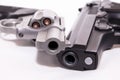 Two handguns, a 40 caliber pistol and a 357 magnum revolver Royalty Free Stock Photo