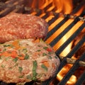 Two Handmade Burgers On The Barbecue Grill. Summer Party Image. Royalty Free Stock Photo
