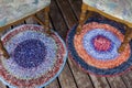Two handmade colorful rugs