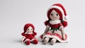 Two handmade rag dolls in Christmas outfits Royalty Free Stock Photo