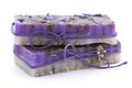 Two handmade soaps with wildflowers on white background Royalty Free Stock Photo