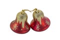 Two handpainted sparkly red and gold holiday bells Royalty Free Stock Photo