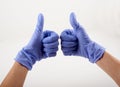 Two hands in blue gloves Royalty Free Stock Photo
