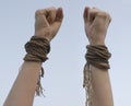 Two hands with broken rope Royalty Free Stock Photo