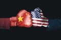 Two hands with China and USA flag Royalty Free Stock Photo