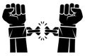 Two hands clenched into a fist tearing chains that they shackled the symbol of the revolution of freedom. Human hands and broken c