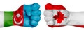 Two hands are clenched into fists and are located opposite each other. Hands painted in the colors of the flags of the countries.