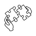 Two hands connecting puzzle pieces, symbolizing teamwork and problem solving Royalty Free Stock Photo