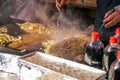 Two hands cooking Yakisoba & x28;japanese fried noodle& x29; on hot iron plate in Japanese fesival market