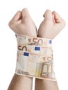 Two hands cuffed bills 50 euros Royalty Free Stock Photo