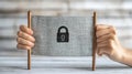 Two hands firmly holding burlap fabric banner black security lock symbolizing digital rights cybersecurity resilience
