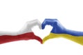 Two hands in the form of heart with Polish and Ukrainian flag isolated on white Royalty Free Stock Photo