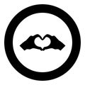 Two hands have shape heart Hands making heart symbol silhouette icon black color illustration in circle round