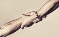 Two hands, helping hand of a friend. Handshake, arms, friendship. Friendly handshake, friends greeting, teamwork Royalty Free Stock Photo