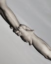 Two hands, helping hand of a friend. Rescue, helping gesture or hands. Strong hold. Handshake, arms, friendship