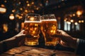 Two hands holding beer mugs and toasting 5 Royalty Free Stock Photo