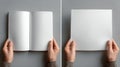 Hands Holding Blank Book and Paper Mockups Royalty Free Stock Photo