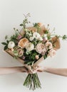 Two Hands Holding a Bouquet of Flowers