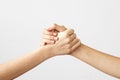 Two hands holding each other strongly Royalty Free Stock Photo