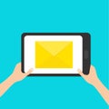 Two hands holding genering tablet gadget Tab. Email icon. Yellow paper envelope. Letter template. New message sign symbol. Unread