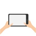Two hands holding genering tablet PC gadget. Male female teen hand and black Tab with blank screen. Empty space template for text.