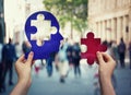 Two hands holding a paper with human head and a puzzle piece. Finding a cure to heal the disease. Mental health concept, memory