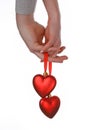 Two hands holding red hearts Royalty Free Stock Photo