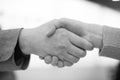 Business Deal and Working Together Cooperatively. Handshake Black and White. People Hand Shaking in Partnership and Friendship. Royalty Free Stock Photo