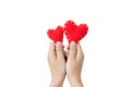 Two hand holding two red heart on white background. Royalty Free Stock Photo