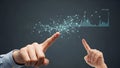 Two hands interacting with a glowing digital network of interconnected nodes and a bar graph data visualization Royalty Free Stock Photo