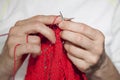 Two hands knitting Royalty Free Stock Photo