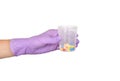 Two Hands in latex medical glove holding a lot of pills isolated on white. Close up. Medicine or health treatment concept Royalty Free Stock Photo