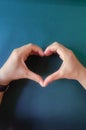 Two hands making heart shape with background Royalty Free Stock Photo