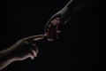 Two hands at the moment of farewell. The holding hands of relations. Help friend through a tough time. Rescue gesture Royalty Free Stock Photo