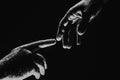 Two hands at the moment of farewell. The holding hands of relations. Help friend through a tough time. Rescue gesture Royalty Free Stock Photo