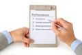 Two hands with performance checklist Royalty Free Stock Photo