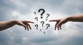 Two hands reaching with floating question marks against cloudy sky symbolizing confusion and inquiry Royalty Free Stock Photo