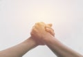 Two hands reaching toward each other. Teamwork and helping Royalty Free Stock Photo