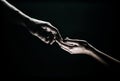 Two hands reaching toward. Tenderness, tendet touch hands in black background. Romantic touch with fingers, love. Hand Royalty Free Stock Photo