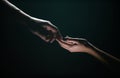 Two hands reaching toward. Tenderness, tendet touch hands in black background. Romantic touch with fingers, love. Hand Royalty Free Stock Photo