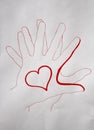 Two hands in red color with one big red heart and one big heart in the center, handmade, hand drawn, red pencil on white backgroun Royalty Free Stock Photo