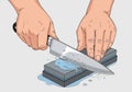 Two hands sharpening a knife on a whetstone. The knife is held in Royalty Free Stock Photo
