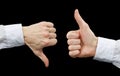 Two hands showing gestures thumb up & thumb down Royalty Free Stock Photo