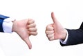 Two hands signalling thumbs up and thumbs down Royalty Free Stock Photo